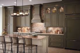 Customized Panels Blend The Appliances Into A Graceful Wall Of Storage Setting Off The Ce Kraftmaid Kitchens Traditional Kitchen Cabinets Kitchen Inspirations