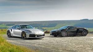 Ferrari 488 pista drag race winner leaves it late. Porsche 911 Turbo S Vs Mclaren Gt Auto Express