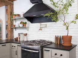 I love the clean fresh look and how bright the space is now. Contemporary Neutral Kitchen With White Brick Backsplash Hgtv