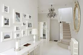 A few simple accessories and furniture pieces can create a gorgeous transitional space. Feature The Family White Hallway Hallway Decorating Hallway Designs