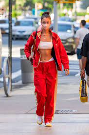 Maybe you would like to learn more about one of these? Bella Hadid Shows Off Abs In Sports Bra And Red Track Suit In Nyc