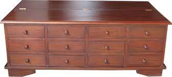 Heel is a family of coffee tables with ironic character, an object that distorts the classic model with unexpected and irreverent details. 12 Drawer Mahogany Coffee Table Lock Stock Barrel