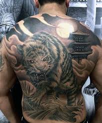 This tiger tattoo allows us to feel that the tiger is peeking over the edge of some obstruction. 70 Japanese Tiger Tattoo Designs For Men Masculine Ideas