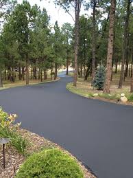 100% pavers asphalt with paver border asphalt if you put down steel edging on both sides in line with the outside edge of the new soldier courses, and fill the 90' drive with pretty tan colored chip seal. 24 Asphalt Driveway Design Ideas Top Rated Driveway Pros In New York