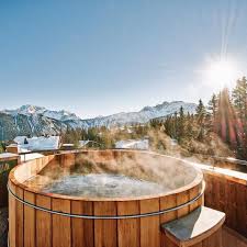 27 Outdoor Hot Springs Tubs Pools To Warm Up Your Winter Travels Hot Tub Outdoor Luxury Ski Chalet Ski Hotel