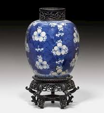 Two chinese blue and white ginger jars with wood covers. Lot Art A Small Blue And White Ginger Jar Decorated With Prunus On Cracked Ice