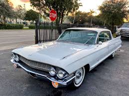 Image result for Platinum Gray 1961 Cadillac