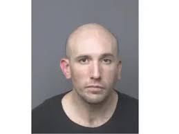 Holy Cross Man Accused of Identity Theft