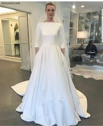 Meghan's coat and matching dress. Simple Bridal A Line 2021 Wedding Dresses With Three Quarter Sleeve New Meghan Markle Style Vintage Bateau Covered Buttons Back Wedding Dresses Aliexpress
