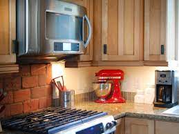 Tape lights or strip lights are an easy solution for adding lighting to complex areas. Easy Under Cabinet Kitchen Lighting Hgtv