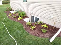 Use recycled glass bottles,shipping pallets, clam shells and even logs to change the boring borders. Landscape Edging What To Do On Grass Side The Lawn Forum