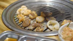 Cooking your own food … Family Visits A Korean Grill Restaurant Where You Can Cook Your Own Food Travel To Korea Concept By Galitskaya