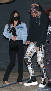 Megan fox appears visibly irritated and displeased with boyfriend machine gun kelly at the billboard music awards in los angeles despite the couple putting on a loved up pda display on the red carpet for the event. Megan Fox And Machine Gun Kelly S Best Style Moments Popsugar Fashion