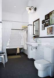 See Dark Floor Contrasts With White Tile With Black Edge White Walls And Dark Accessories Gary S Kitch Bathroom Floor Tiles Black Bathroom Bathroom Flooring