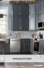 Rustic Meets Modern In This Samsung Kitchen Our Sleek Stainless Steel Appliances Come To Life When Set Rustic Kitchen Cabinets Rustic Kitchen Samsung Kitchen