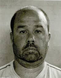 Police: Woman hits husband, son with car; husband charged with assault