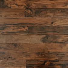 Engineered hardwood floors are for the most part prefinished, but can be obtained unfinished for those that prefer a custom color on site after sanding. Mazama 3 Solid Acacia Flooring In Golden Walnut Acacia Flooring Flooring Hardwood