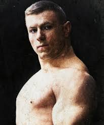 Colorized photos of strongman and wrestler George Hackenschmidt, c. 1904.  George Hackenschmidt (1877-1968) broke numerous weightlifting records, in  the process performing lifts like a 250lb one handed overhead press and a  311lb