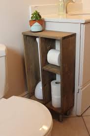 You can add a tissue box, extra toilet paper, or even seasonal décor to the shelf. Toilet Paper Cabinet Free Woodworking Plan Com