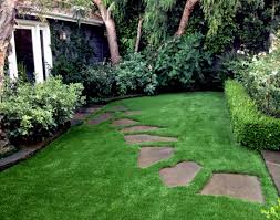 Turf And Stepping Stones Fake Grass Backyard Artificial Grass Backyard Small Backyard Landscaping