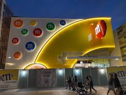 04:20 музыка на канале disney. Photos First Look At Illuminated M M S Store Facade In Disney Springs Wdw News Today