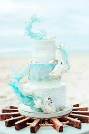 15 Wedding Cake Ideas That Ll Wow Your Guests Wedding Forward Beach Theme Wedding Cakes Themed Wedding Cakes Beach Wedding Cake