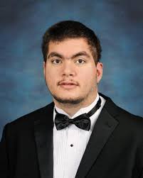 Caudillo graduates from School for the Deaf and the Blind.