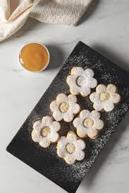 Lemon curd cookies are the most yummiest bite size, crisp, melt in the mouth cookies with a spoonful of smooth, silky, tangy, sweet lemon curd filled into it. Lavender Flower Cookies With Lemon Curd Nugget Markets Image
