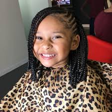 If your kids are wearing #naturalhair, you're going to want to check out these #hairstyles for ideas on how to make it suit. 15 Super Cute Protective Styles For Kids Essence