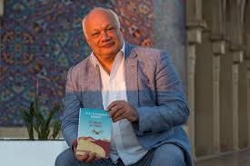 French wrtier eric emmanuel schmitt poses at the 34th salon du livre de paris book fair in paris, on march 22, 2014. Eric Emmanuel Schmitt La Venganza Del Perdon Fotografia Flickr