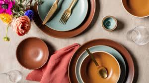 Earthenware grape plates have decal accents and are handpainted with a gloss finish. Dinnerware Sets Heath Ceramics