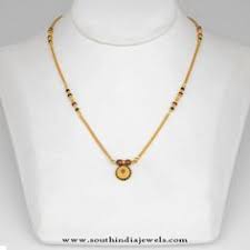 It typically contains a string of tiny black beads along with a pendant in the centre. 120 Mangalsutra Design Ideas Black Beaded Jewelry Gold Mangalsutra Designs Gold Jewellery Design