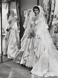 Elizabeth Taylor S Wedding Dress In Father Of The Bride Expensive Wedding Dress Wedding Dress History Wedding Movies