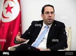 Tunis, Tunisia. 30th Dec, 2016. Tunisian Prime Minister Youssef Chahed  speaks with journalists in Tunis, Tunisia, 30 December 2016. Tunisia wants  to take more action against Islamist citizens and directly arrest or
