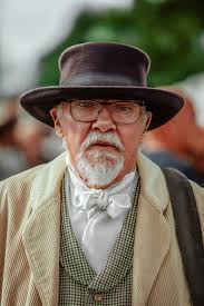 Satisfied Man Photographer unknown