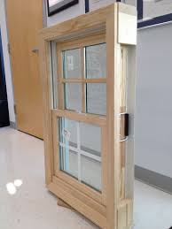 Ply Gem Wood Clad Double Hung Window With 7 8 Simulated Divided Lite Grids On Top Sash And 5 8 Flat Grilles Double Hung Windows Window Styles Wood Interiors
