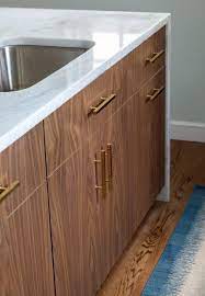 Brown kitchen cabinets with gold hardware. Havertown Petite Kitchen Design Manifest Kitchen Design New Kitchen Designs Walnut Kitchen