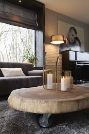 De Munggur Is Een Trendy Salontafel En In Alle Maten Verkrijgbaar Door De Wieltjes Onder De Tafel Is De Tafel Mak Woonkamer Groen Rustiek Huis Kamer Decoratie