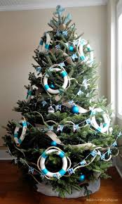 Blend traditional christmas decor with beach decor for a cozy, festive atmosphere. Unique Ways To Decorate A Nautical Christmas Tree Beach Style Christmas Decorations Christmas Tree Themes Unique Christmas Trees