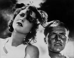 He was 25 years old , She was 15 years old , For a while they lived  together in a treehouse . In 1959 , she watched while he killed a lot of  people! BADLANDS