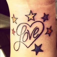 Ensure that the wavy lines connect with the symbols used well. Love Heart Tattoo Designs Images Gallery