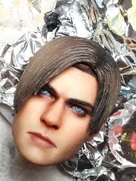 Crappy cellphone photos of My 3D-artist resin cast 1:6 Leon S. Kennedy head  sculpt, once again. I just repainted the eyes this...