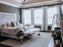 A clean, fresh white room is always going to be a beautiful backdrop for wood, textiles and patterned rugs and pillows. Boho Chic Master Bedroom Novocom Top