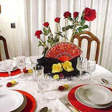Table Setting Idea For A Spanish Dinner Party The Centerpiece Is Made With A Fan Man Dinner Party Decorations Dinner Party Table Settings Dinner Party Themes