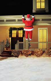 Santa Claus Is Coming To Town Use This Quirky Outdoor Inflatable Outdoor Christmas Decorations Outside Christmas Decorations Decorating With Christmas Lights
