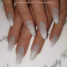 Black and white ombre nails. Grey To White Ombre And Glitter On Coffin Nails Nail Artist Beautynailsvera Follow Her Ombre Nails Glitter Ombre Acrylic Nails Grey Acrylic Nails