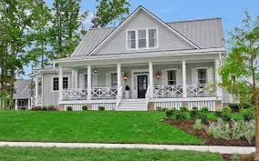 Whoever chose this green has a good eye for color selection. See Some Of Our Favorite Southern Living House Plans On Hallsley S Street Of Hope Southern Living House Plans Southern House Plans House Paint Exterior