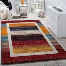 Ein teppich auf dem es sich weich läuft und der jeden einzelnen schritt abfedert? Designer Teppich Mit Bordure Gabbeh Optik Rot Teppichcenter24