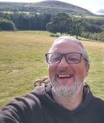 What housing options are available in Nevada County for a handyman seeking  communal living and spiritual growth?