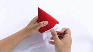 Create the hat's point by marking the centre along the top short side of the rectangle, and draw two diagonal lines down to the edges of the horizontal line. 3 Ways To Make A Santa Hat Wikihow